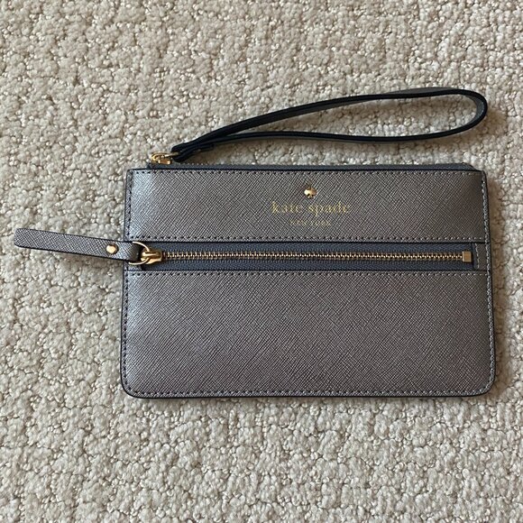 kate spade Handbags - Kate Spade Silver Wristlet Wallet